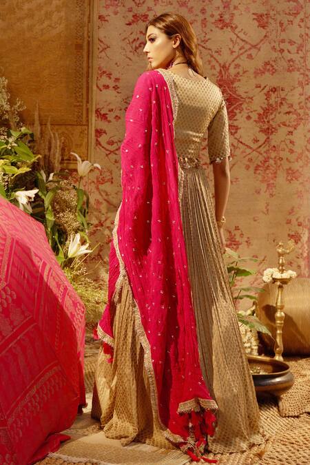 Shop Bhumika Sharma Gold Satin Crepe V Neck Printed Lehenga Set at Aza Fashions Shop_Bhumika Sharma_Gold Satin Crepe V Neck Printed Lehenga Set_at_Aza_Fashions