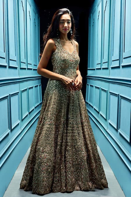 Shop Angad Singh Gold Net V Neck Sequin Embellished Gown at Aza Fashions Shop_Angad Singh_Gold Net V Neck Sequin Embellished Gown _at_Aza_Fashions