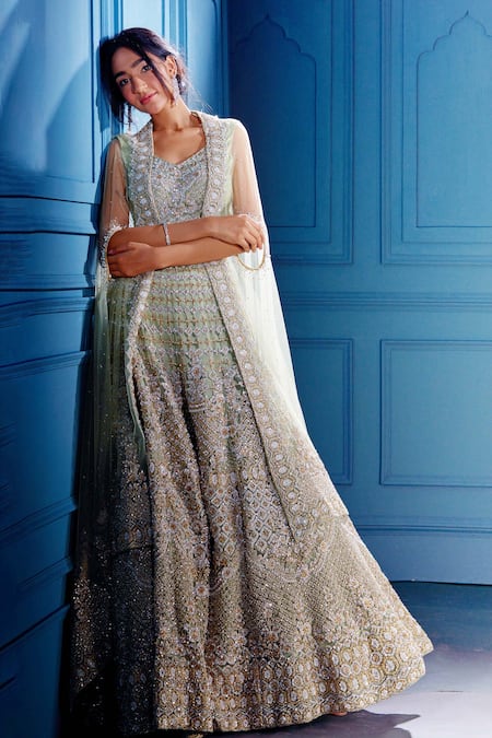 Shop Angad Singh Green Net Interlining Satin V Neck Embroidered Cape And Lehenga Set at Aza Fashions Shop_Angad Singh_Green Net Interlining Satin V Neck Embroidered Cape And Lehenga Set _at_Aza_Fashions