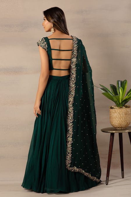 Shop Anupraas By Nishant And Rahul Green Organza, Bamberg Silk V Neck Embroidered Blouse And Lehenga Set at Aza Fashions Shop_Anupraas By Nishant And Rahul_Green Organza, Bamberg Silk V Neck Embroidered Blouse And Lehenga Set _at_Aza_Fashions