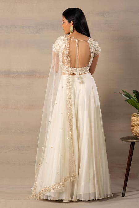 Shop Anupraas By Nishant And Rahul White Organza, Bamberg Silk Round Embroidered Blouse And Lehenga Set at Aza Fashions Shop_Anupraas By Nishant And Rahul_White Organza, Bamberg Silk Round Embroidered Blouse And Lehenga Set _at_Aza_Fashions