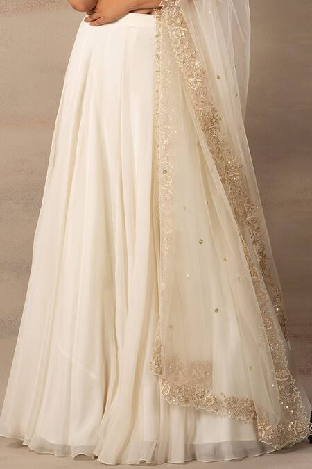 Shop Anupraas By Nishant And Rahul White Organza, Bamberg Silk Round Embroidered Blouse And Lehenga Set Online at Aza Fashions Shop_Anupraas By Nishant And Rahul_White Organza, Bamberg Silk Round Embroidered Blouse And Lehenga Set _Online_at_Aza_Fashions
