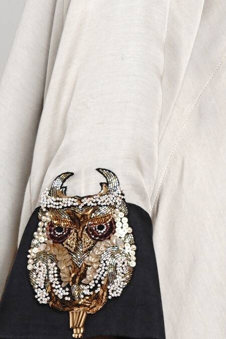 Shop Angry Owl Beige Modal Open Contrast Cuff Asymmetric Cape Online at Aza Fashions Shop_Angry Owl_Beige Modal Open Contrast Cuff Asymmetric Cape _Online_at_Aza_Fashions