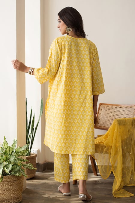 Shop Gulabo Jaipur Yellow Cotton, Doriya Floral V Neck Print Kurta Set at Aza Fashions Shop_Gulabo Jaipur_Yellow Cotton, Doriya Floral V Neck Print Kurta Set _at_Aza_Fashions