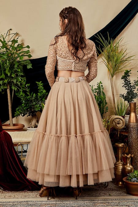 Shop Asra Beige Net, Velvet, Crepe V Neck Tiered Lehenga Set at Aza Fashions Shop_Asra_Beige Net, Velvet, Crepe V Neck Tiered Lehenga Set _at_Aza_Fashions