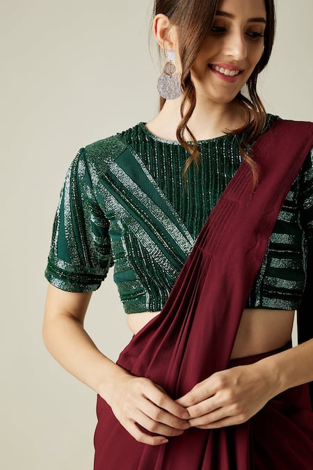 Shop Aakaar Wine Moss Crepe Crystal Work Round Ruby Pre-draped Saree With Blouse Online at Aza Fashions Shop_Aakaar_Wine Moss Crepe Crystal Work Round Ruby Pre-draped Saree With Blouse _Online_at_Aza_Fashions
