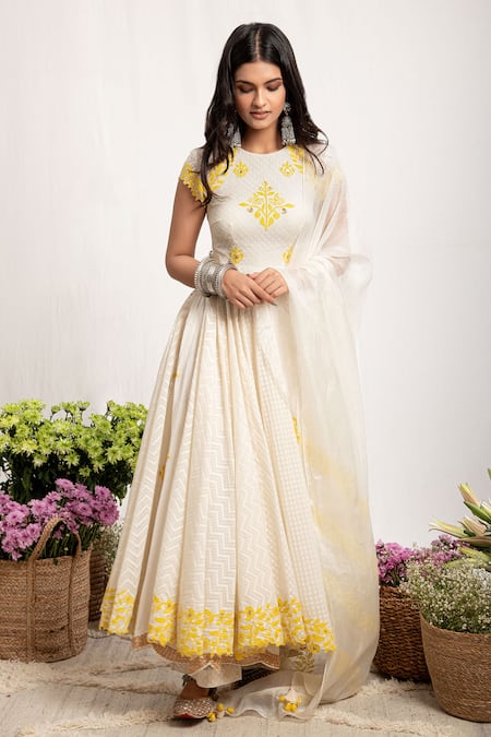 White anarkali with golden 2024 border