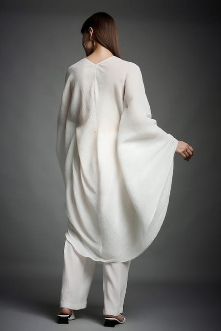 Shop Neha Gursahani White Crinkled Cotton V Neck Draped Top And Pant Set at Aza Fashions Shop_Neha Gursahani_White Crinkled Cotton V Neck Draped Top And Pant Set _at_Aza_Fashions