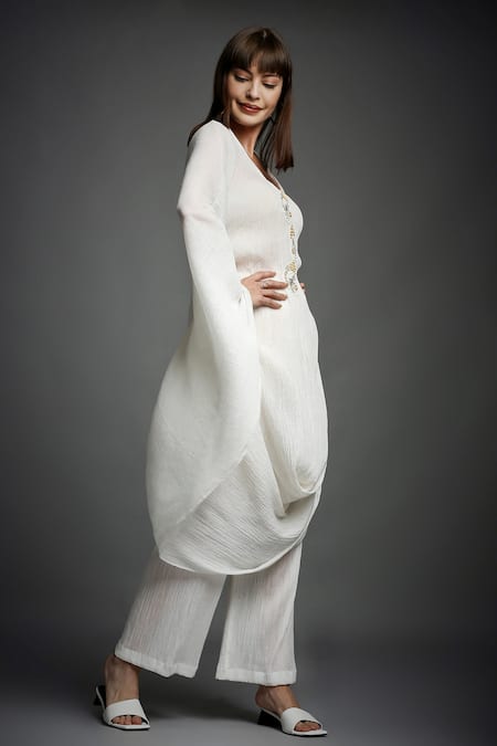 Neha Gursahani White Crinkled Cotton V Neck Draped Top And Pant Set Online at Aza Fashions Neha Gursahani_White Crinkled Cotton V Neck Draped Top And Pant Set _Online_at_Aza_Fashions