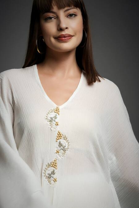 Neha Gursahani White Crinkled Cotton V Neck Draped Top And Pant Set at Aza Fashions Neha Gursahani_White Crinkled Cotton V Neck Draped Top And Pant Set _at_Aza_Fashions
