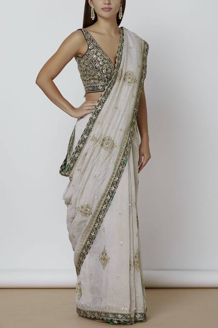 Sue Mue_Off White Plunging V-shaped Neckline Embroidered Saree With Blouse _Online_at_Aza_Fashions
