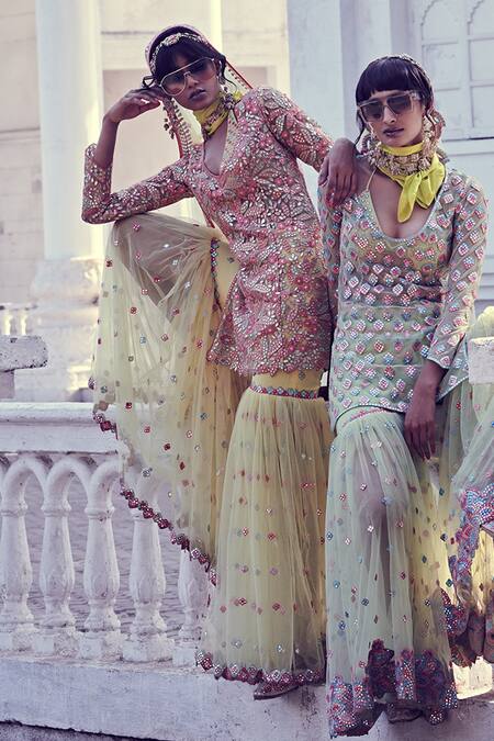 Shop Tamanna Punjabi Kapoor Yellow Soft Net U Neck Floral Mirror Embellished Kurta And Sharara Set at Aza Fashions Shop_Tamanna Punjabi Kapoor_Yellow Soft Net U Neck Floral Mirror Embellished Kurta And Sharara Set _at_Aza_Fashions