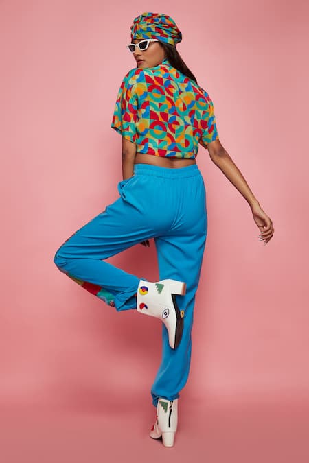 Shop Esha L Amin Blue Rayon Geometric Motifs Half Printed Joggers at Aza Fashions Shop_Esha L Amin_Blue Rayon Geometric Motifs Half Printed Joggers_at_Aza_Fashions