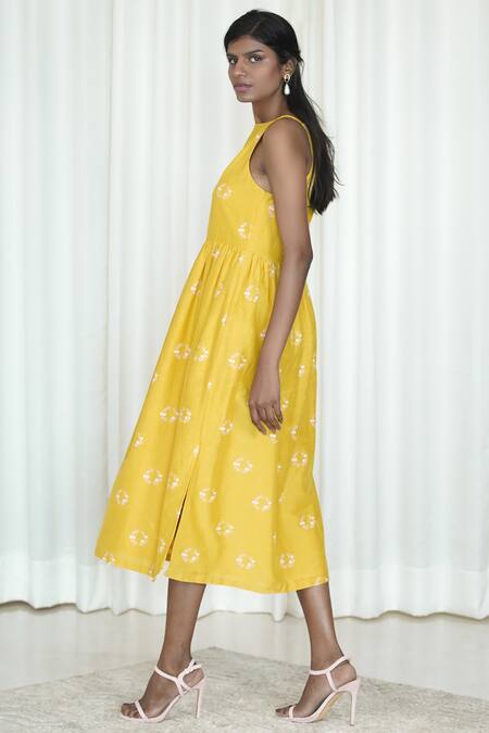 Shiori_Yellow Cotton Silk Round Printed Midi Slit Dress_Online_at_Aza_Fashions