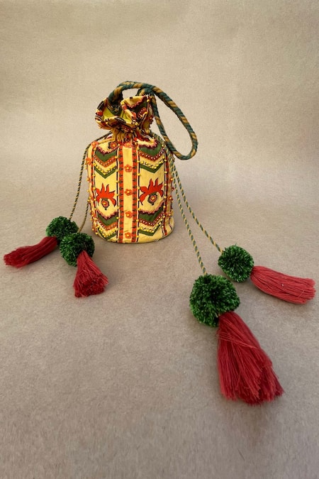 Buy_Baise Gaba_Yellow Embroidery, Tassels Crepe Potli Bag _Online_at_Aza_Fashions