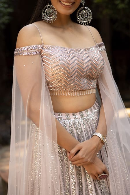 Basanti - Kapde Aur Koffee_Pink Net Sequin And Beads One Shoulder Embellished Blouse & Lehenga Set_at_Aza_Fashions