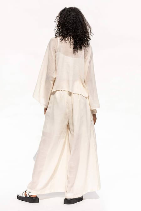 Shop Corpora Studio White High Neck Flared Pant Set at Aza Fashions Shop_Corpora Studio_White High Neck Flared Pant Set _at_Aza_Fashions