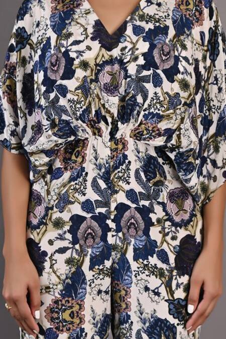 Shop_Bohame_Off White Crepe Floral V Neck Zinnia Print Jumpsuit_Online_at_Aza_Fashions