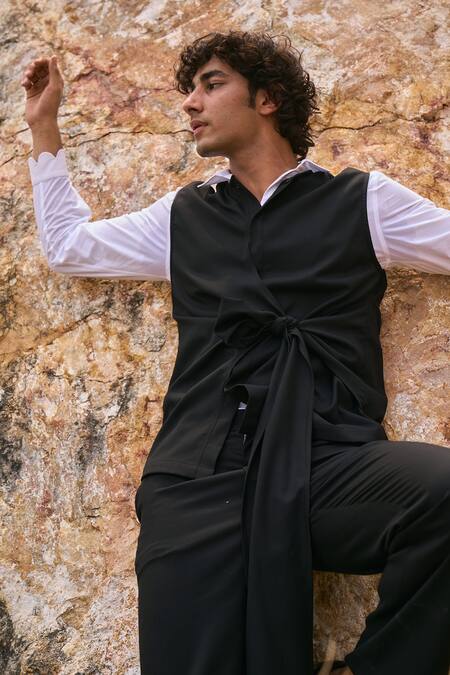 Shop_Dash And Dot_Black 2% Lycra, 35% Viscose, 63% Polyester Sleeveless Tie-up Jacket_Online_at_Aza_Fashions