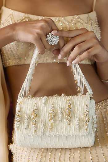Buy Lovetobag Ivory Embellished Nora Flapover Clutch at Aza Fashions Buy_Lovetobag_Ivory Embellished Nora Flapover Clutch _at_Aza_Fashions