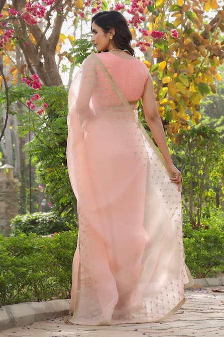Shop Charu Makkar Peach Pure Silk Organza Batik Floral Saree at Aza Fashions Shop_Charu Makkar_Peach Pure Silk Organza Batik Floral Saree _at_Aza_Fashions
