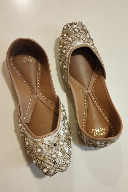 Shop Cilwana Studio Ivory Gota Patti Embroidered Juttis at Aza Fashions Shop_Cilwana Studio_Ivory Gota Patti Embroidered Juttis _at_Aza_Fashions