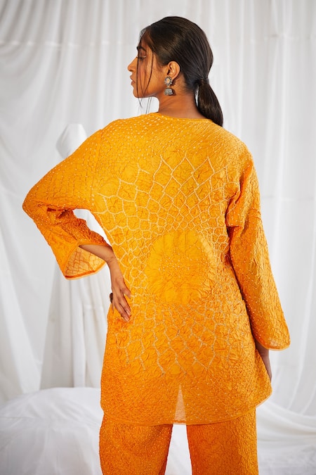 Shop Twenty Nine Yellow Crushed Silk Bandhani V Neck Wrap Top at Aza Fashions Shop_Twenty Nine_Yellow Crushed Silk Bandhani V Neck Wrap Top _at_Aza_Fashions
