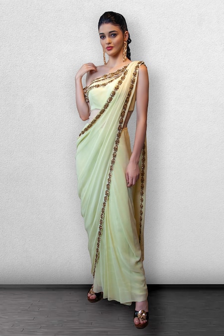 Shop_Jade By Ashima_Yellow Net, Georgette Asymmetric Draped One Shoulder Saree Gown _at_Aza_Fashions