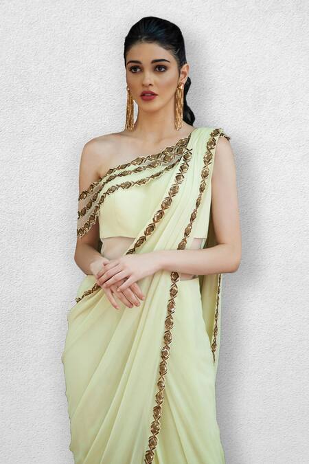 Jade By Ashima_Yellow Net, Georgette Asymmetric Draped One Shoulder Saree Gown _Online_at_Aza_Fashions