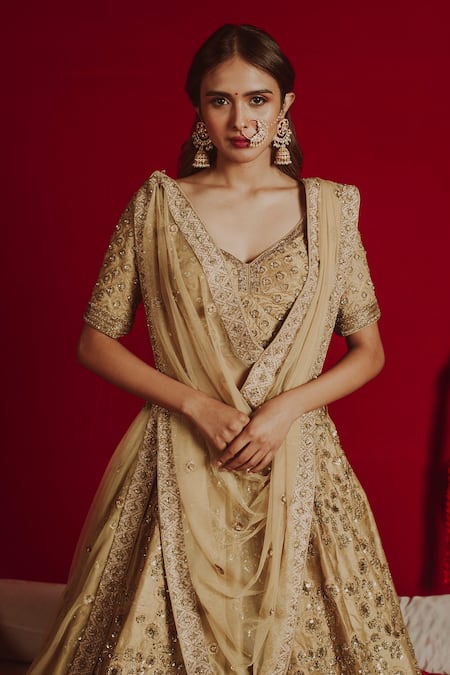 Aangan By Parul Gold Net, Dupion, Satin And Cambric Jaal, Thread & Sequin Embroidered Lehenga Set Online at Aza Fashions Aangan By Parul_Gold Net, Dupion, Satin And Cambric Jaal, Thread & Sequin Embroidered Lehenga Set _Online_at_Aza_Fashions