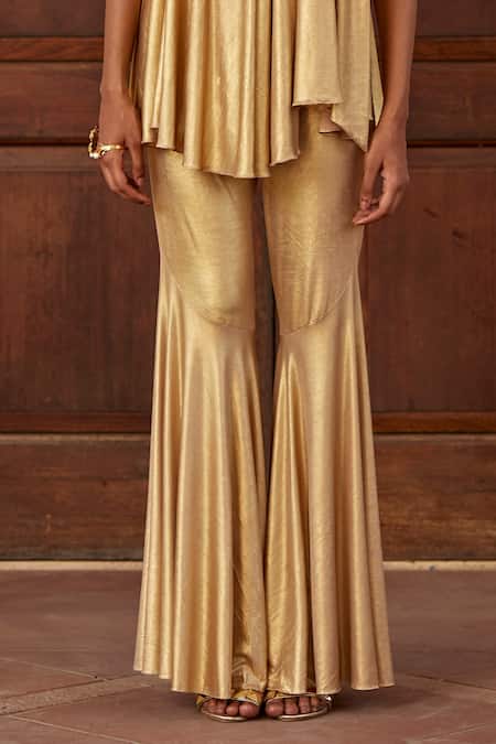 Shop Dania Siddiqui Gold Lycra Plain Aya Bell Bottom Pant Online at Aza Fashions Shop_Dania Siddiqui_Gold Lycra Plain Aya Bell Bottom Pant _Online_at_Aza_Fashions