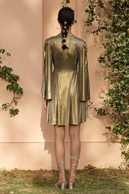 Shop Dania Siddiqui Gold Lycra Plain V Neck Nubia Wrap Dress at Aza Fashions Shop_Dania Siddiqui_Gold Lycra Plain V Neck Nubia Wrap Dress _at_Aza_Fashions