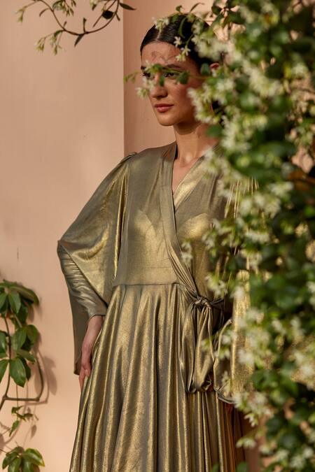 Buy Dania Siddiqui Gold Lycra Plain V Neck Nubia Wrap Dress Online at Aza Fashions Buy_Dania Siddiqui_Gold Lycra Plain V Neck Nubia Wrap Dress _Online_at_Aza_Fashions