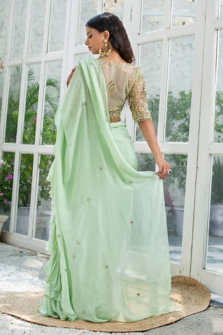 Shop Kanj By Priyanka A Sakhuja Green Silk Tabby Sequin, Cutdana And Bead Del Pre-draped Ruffle Saree With Blouse at Aza Fashions Shop_Kanj By Priyanka A Sakhuja_Green Silk Tabby Sequin, Cutdana And Bead Del Pre-draped Ruffle Saree With Blouse _at_Aza_Fashions