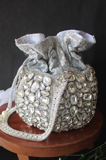 Shop Nayaab By Sonia Silver Embroidery, Stones, Beads, Sequins Kundan And Cut Daana Potli Bag at Aza Fashions Shop_Nayaab By Sonia_Silver Embroidery, Stones, Beads, Sequins Kundan And Cut Daana Potli Bag _at_Aza_Fashions