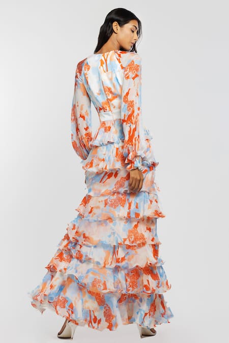 Shop Mandira Wirk Resort White Chiffon Tropical Print V Neck Maxi Dress at Aza Fashions Shop_Mandira Wirk Resort_White Chiffon Tropical Print V Neck Maxi Dress _at_Aza_Fashions