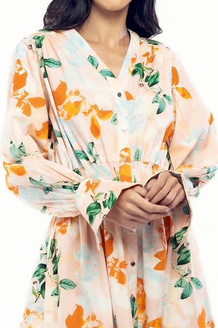 Mandira Wirk Resort Peach Cotton Floral Print V Neck Shirt Dress at Aza Fashions Mandira Wirk Resort_Peach Cotton Floral Print V Neck Shirt Dress _at_Aza_Fashions