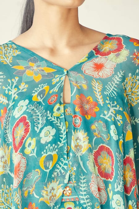 Diyarajvvir_Blue Georgette, Modal Floral V Neck Print Jumpsuit With Cape _at_Aza_Fashions