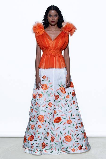 Shriya Som Orange V Neck Pleated Peplum Top Online at Aza Fashions Shriya Som_Orange V Neck Pleated Peplum Top _Online_at_Aza_Fashions