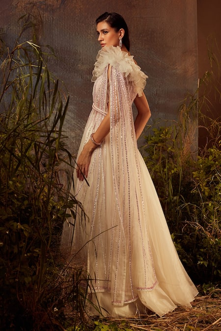 Shop Dheeru Taneja White Organza, Net, Crepe Bugle Beads And Embroidered Ruffle Blouse & Lehenga Set at Aza Fashions Shop_Dheeru Taneja_White Organza, Net, Crepe Bugle Beads And Embroidered Ruffle Blouse & Lehenga Set _at_Aza_Fashions