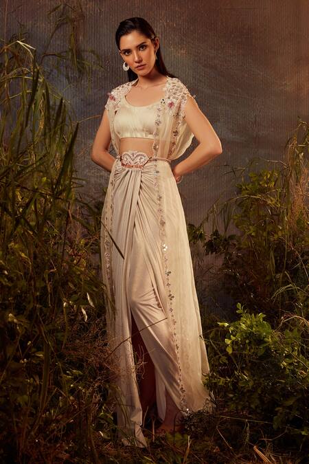 Shop Dheeru Taneja White Organza, Lycra, Foil Bugle Beads And Embroidered Cape & Draped Skirt Set at Aza Fashions Shop_Dheeru Taneja_White Organza, Lycra, Foil Bugle Beads And Embroidered Cape & Draped Skirt Set _at_Aza_Fashions