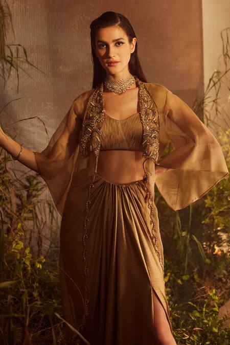 Dheeru Taneja Gold Organza, Lycra, Foil Bugle Beads And Zari Scoop Neck Cape & Skirt Set Online at Aza Fashions Dheeru Taneja_Gold Organza, Lycra, Foil Bugle Beads And Zari Scoop Neck Cape & Skirt Set _Online_at_Aza_Fashions