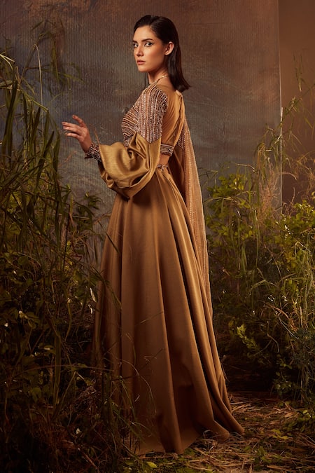 Shop Dheeru Taneja Gold Organza, Lycra, Foil Bugle Beads And Zari Sweetheart Neck Kiara Lehenga Set at Aza Fashions Shop_Dheeru Taneja_Gold Organza, Lycra, Foil Bugle Beads And Zari Sweetheart Neck Kiara Lehenga Set _at_Aza_Fashions