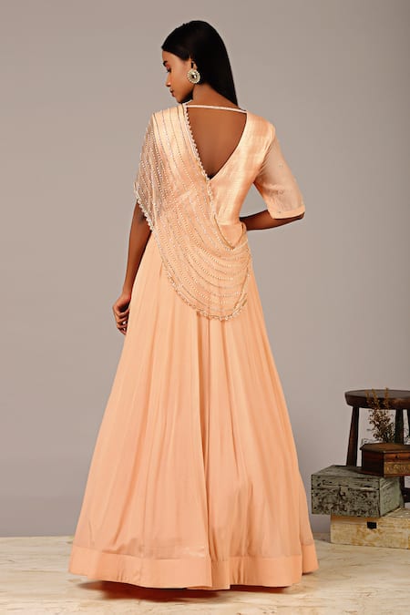 Shop_Nidhika Shekhar_Peach Organza Silk Lining Shantoon V Neck Draped Saree Gown _at_Aza_Fashions