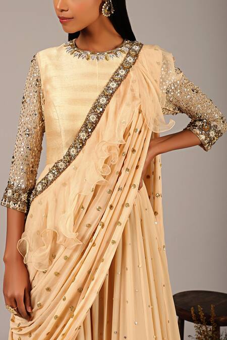 Buy_NIDHIKA SHEKHAR_Beige Georgette Crepe Silk Lining Shantoon Round Ruffle Draped Saree Gown _Online_at_Aza_Fashions