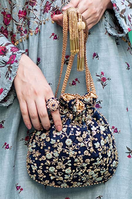 Buy Green Zari Embroidered Silk Potli Bag by AMYRA Online at Aza Fashions.