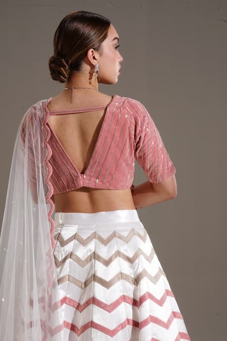 Buy Shloka Sudhakar White Net, Satin, Suede Chevron V Neck Applique Work Lehenga Set Online at Aza Fashions Buy_Shloka Sudhakar_White Net, Satin, Suede Chevron V Neck Applique Work Lehenga Set _Online_at_Aza_Fashions