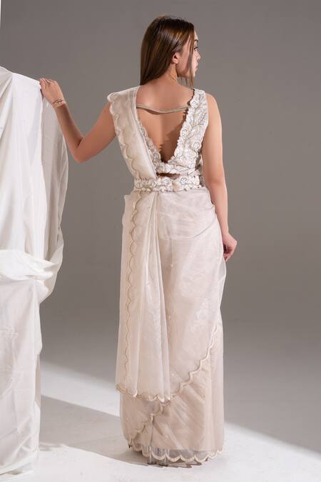 Shop Shloka Sudhakar Beige Organza, Suede Floral Square Neck Scallop Saree With Blouse at Aza Fashions Shop_Shloka Sudhakar_Beige Organza, Suede Floral Square Neck Scallop Saree With Blouse _at_Aza_Fashions