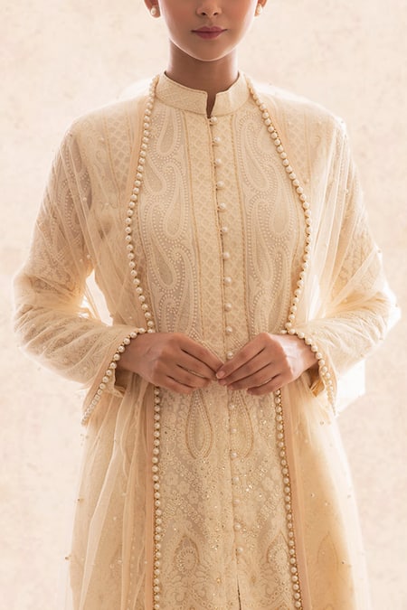 Evra By Nikita Gold Georgette Mandarin Collar Chikankari Kurta Sharara Set at Aza Fashions Evra By Nikita_Gold Georgette Mandarin Collar Chikankari Kurta Sharara Set _at_Aza_Fashions