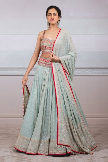 Tarun Tahiliani - Unveiling BLOOM - The Couture 2019 Collection at India  Couture Week. India Modern represented by an Ombré jamevaar lehenga, with  kashida embroidery done with fine zari thread work. The